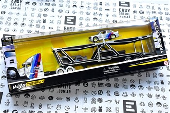 CAMINHÃO CEGONHA  -MACK ANTHEM E BMW 3 SERIES 3 (1998) - MAISTO - 1/64